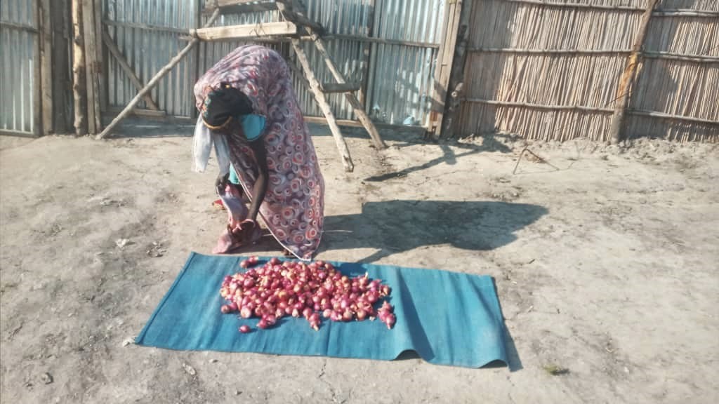 “I am very grateful to Coalition for Humanity for this program, I don’t know what would have become of my family in the face of the severe hunger we were facing”, Nyakual says as she displays her onions for selling